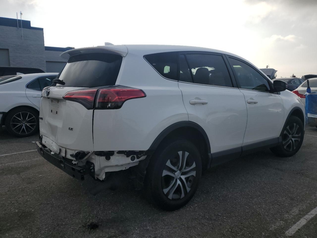 2018 Toyota RAV 4 VIN JTMZFREV3JJ169939 Copart auction photo, rear end damage thumbnail 3
