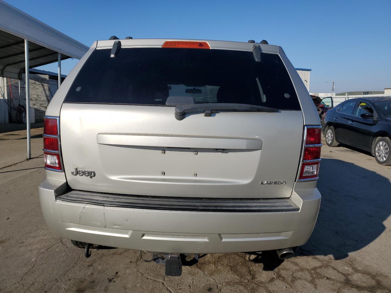 2007 Jeep Grand Cherokee VIN 1J8GS48K27C699283 Copart auction photo, vandalism damage thumbnail 6