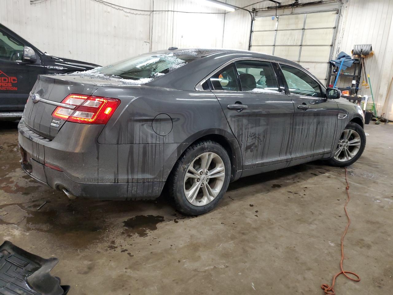 2015 Ford Taurus VIN 1FAHP2H88FG157057 Copart auction photo, front end / side damage thumbnail 3