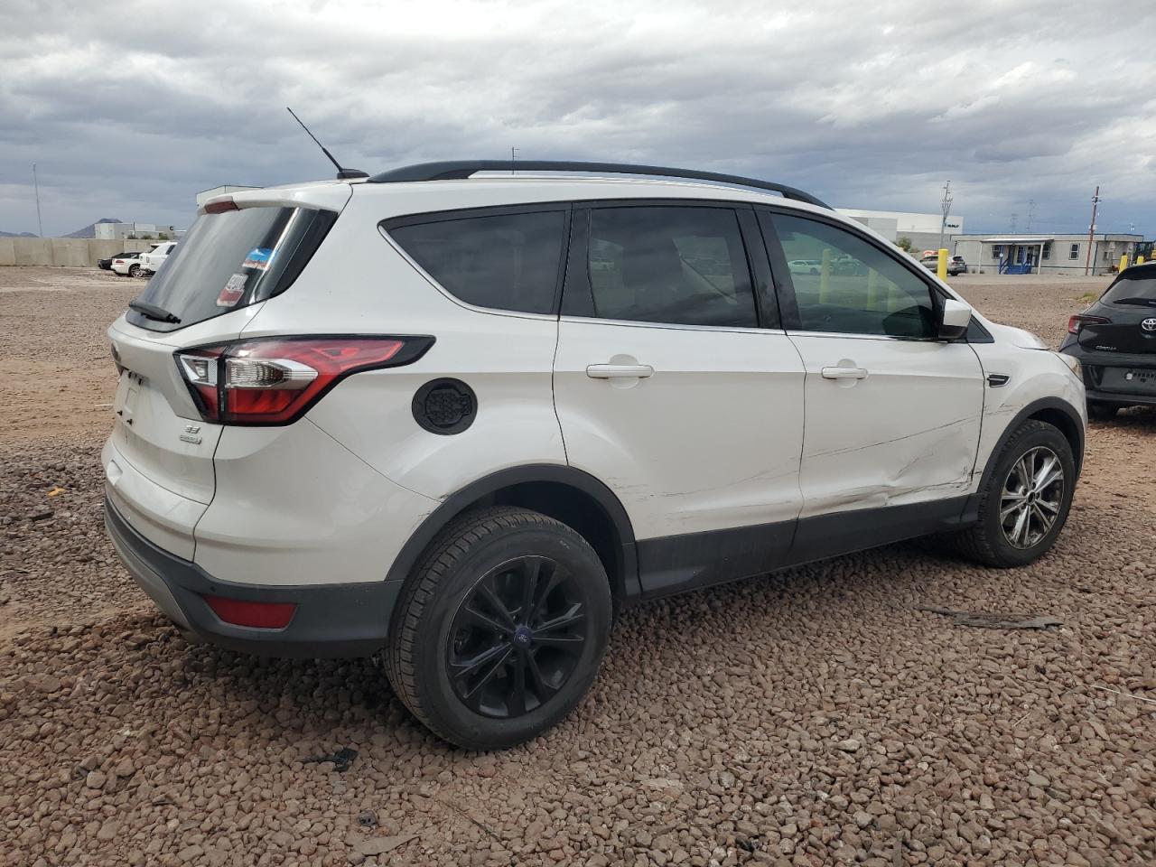2017 Ford Escape VIN 1FMCU0GD2HUB61279 Copart auction photo, side / front end damage thumbnail 3
