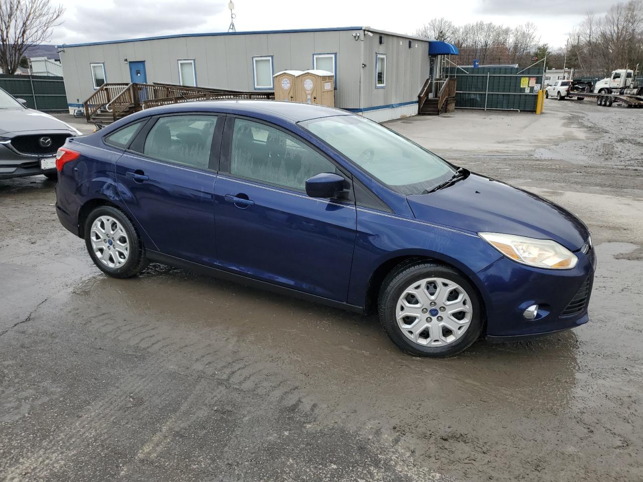 2012 Ford Focus VIN 1FAHP3F21CL163306 Copart auction photo, side damage thumbnail 4