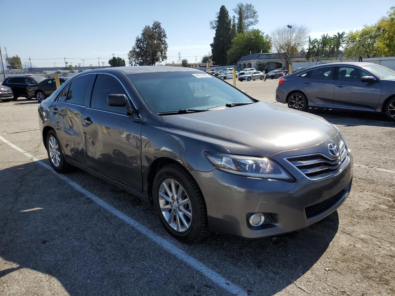 2010 Toyota Camry VIN JTNBK3EK0A3046938 Copart auction photo, side / minor dent/scratches damage thumbnail 4