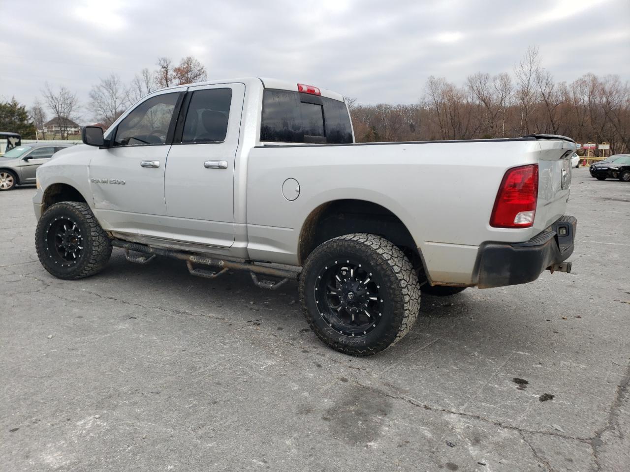 2011 Dodge RAM VIN 1D7RV1GP2BS674763 Copart auction photo, side / rear end damage thumbnail 2