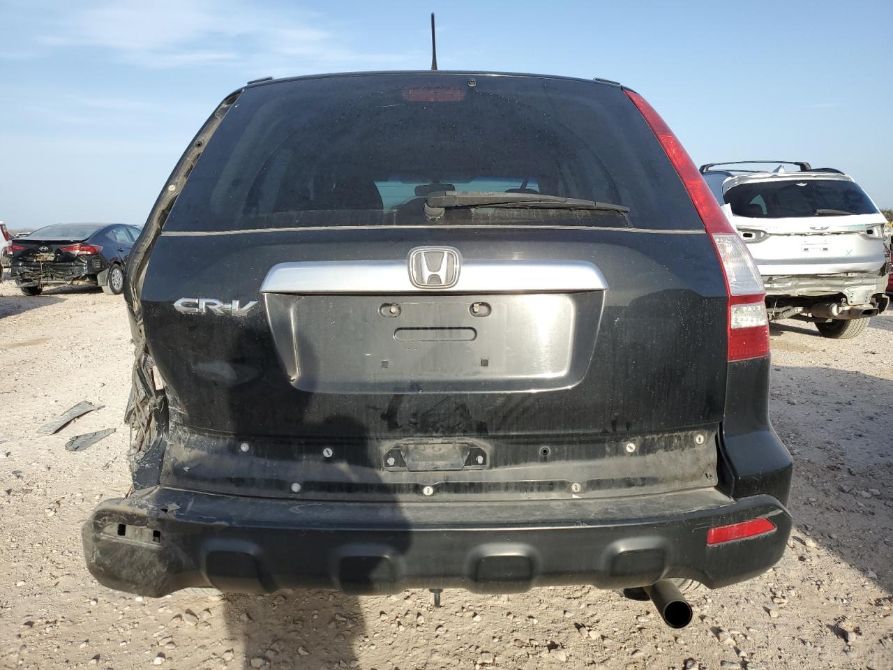 2009 Honda CR-V VIN 3CZRE38579G700014 Copart auction photo, rear end / minor dent/scratches damage thumbnail 6