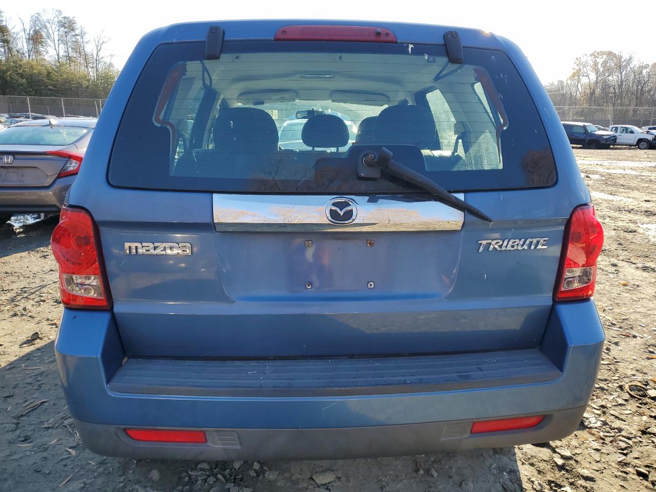 2009 Mazda Tribute VIN 4F2CZ02779KM04265 Copart auction photo, side damage thumbnail 6