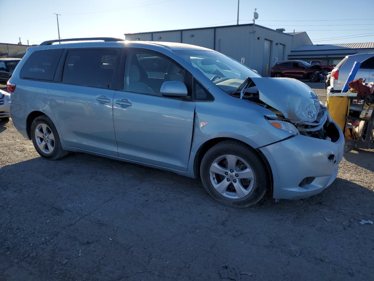 2015 Toyota Sienna VIN 5TDKK3DC7FS669509 Copart auction photo, front end / side damage thumbnail 4