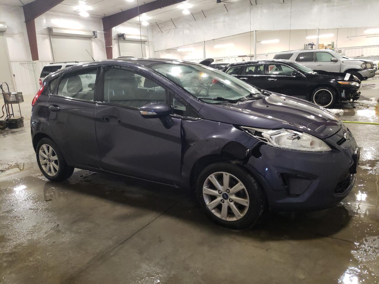 2013 Ford Fiesta VIN 3FADP4EJ3DM109289 Copart auction photo, front end / side damage thumbnail 4