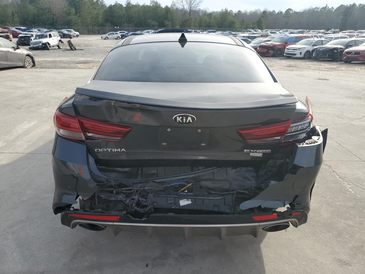 2017 KIA Optima VIN 5XXGW4L28HG125596 Copart auction photo, rear end damage thumbnail 6