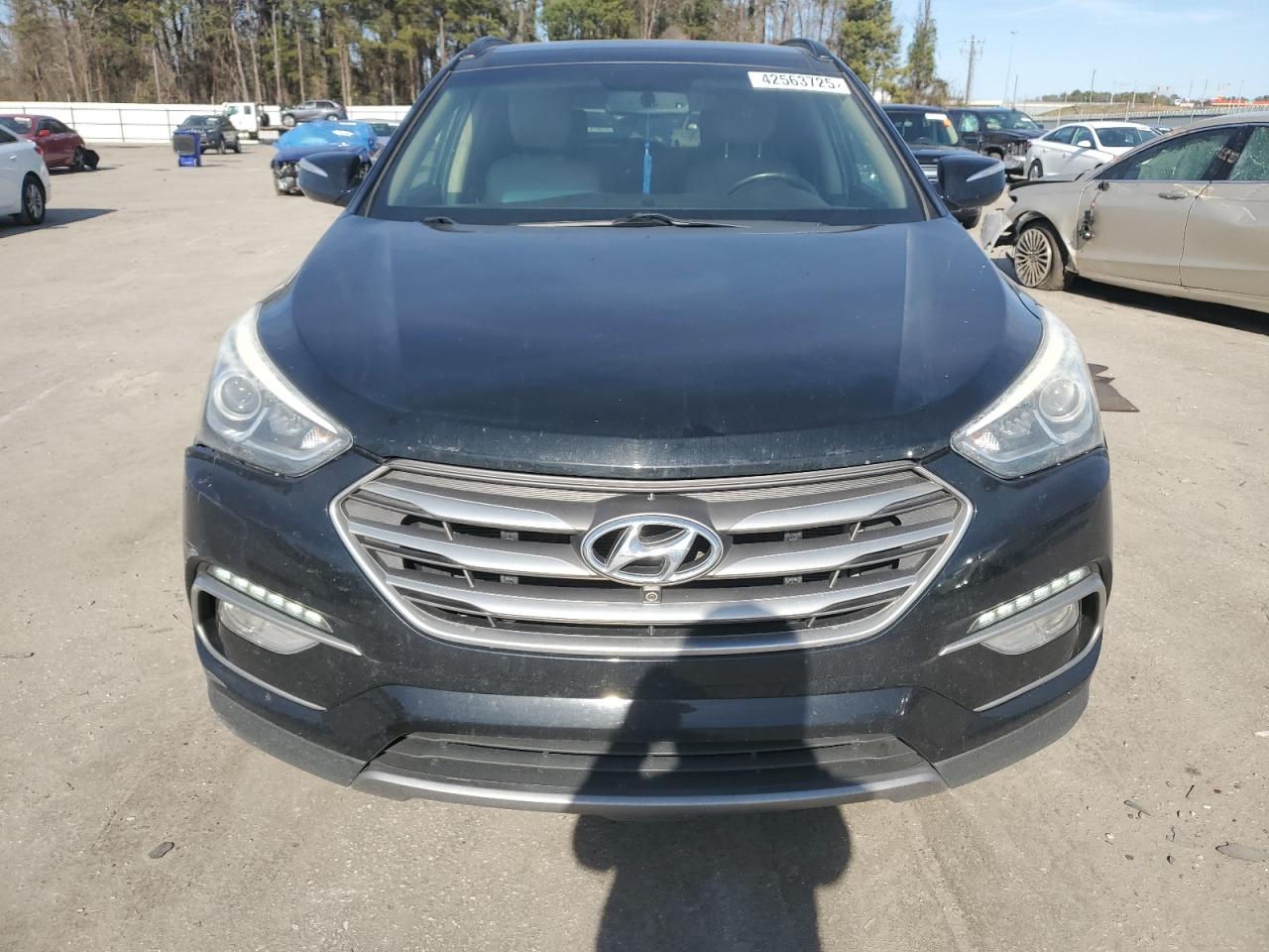 2018 Hyundai Santa Fe VIN 5NMZU3LB5JH057077 Copart auction photo, side / front end damage thumbnail 5