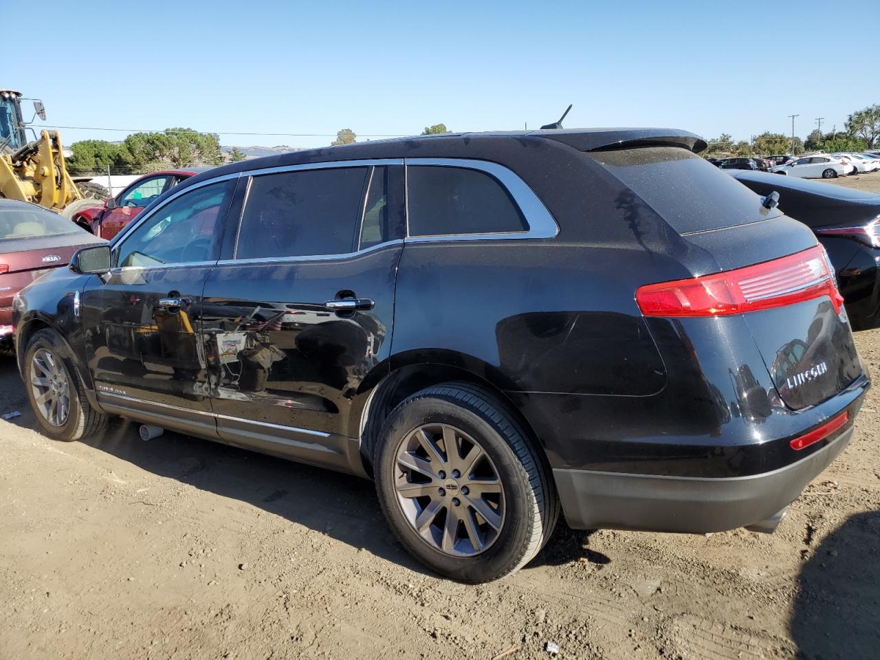 2019 Lincoln MKT VIN 2LMHJ5NK1KBL00395 Copart auction photo, side damage thumbnail 2