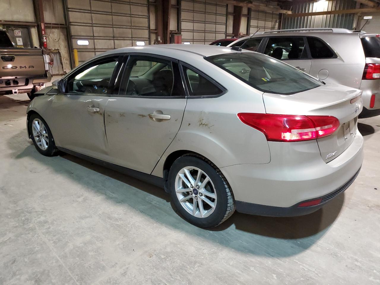 2016 Ford Focus VIN 1FADP3F20GL250716 Copart auction photo, front end / minor dent/scratches damage thumbnail 2