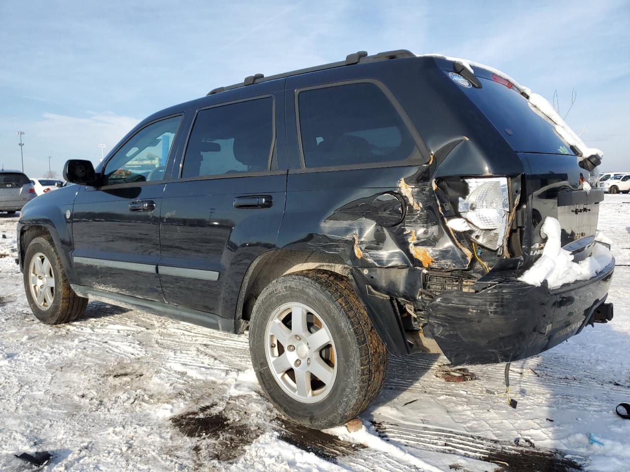 2009 Jeep Grand Cherokee VIN 1J8HR48P39C514527 Copart auction photo, side / rear end damage thumbnail 2