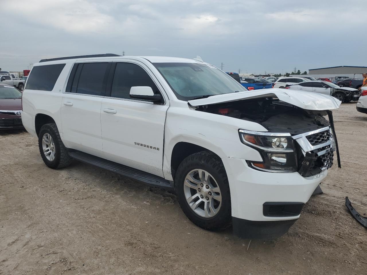 2020 Chevrolet Suburban VIN 1GNSCHKC6LR103064 Copart auction photo, front end / side damage thumbnail 4