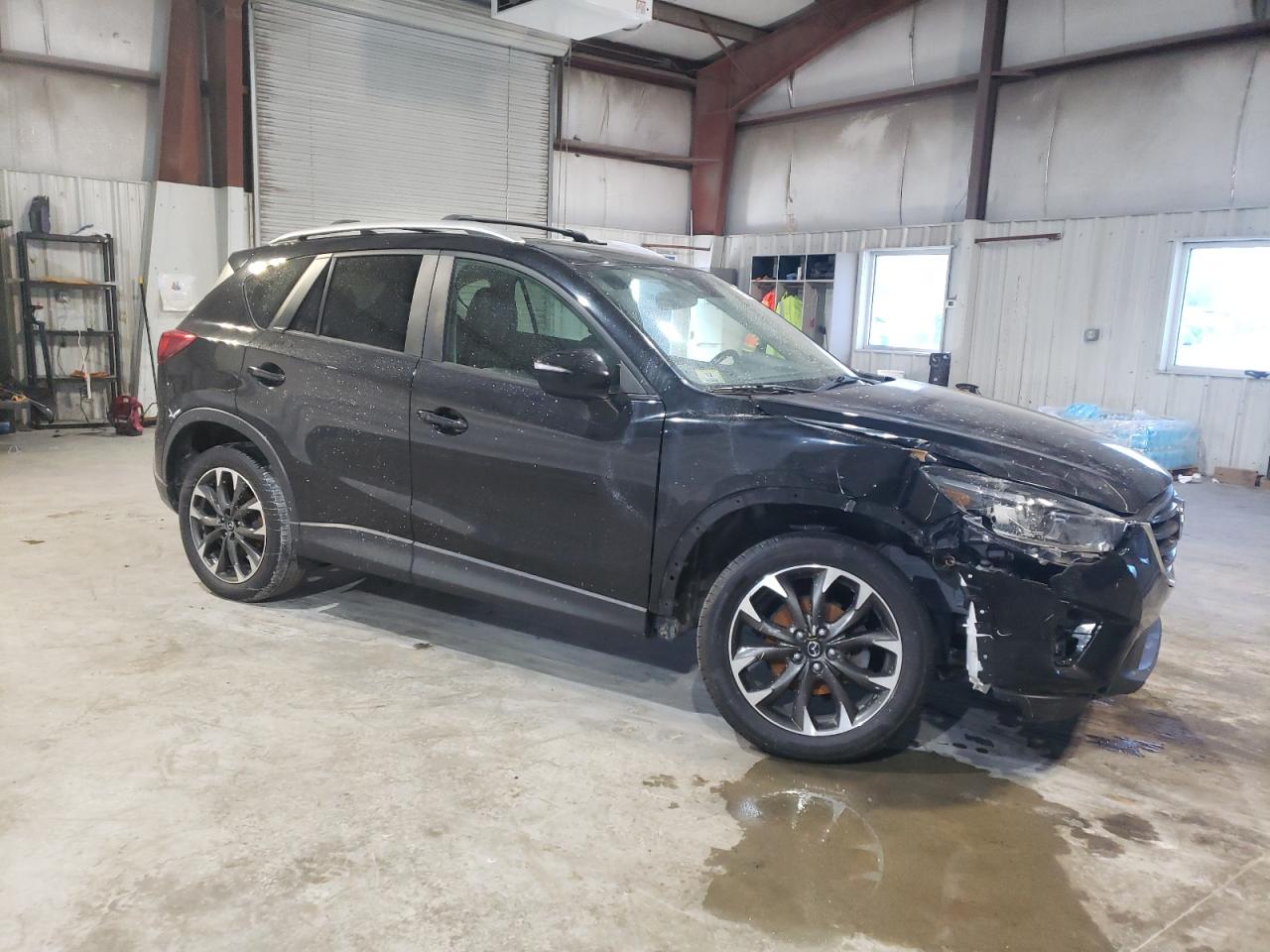 2016 Mazda CX-5 VIN JM3KE4DY6G0655802 Copart auction photo, side damage thumbnail 4