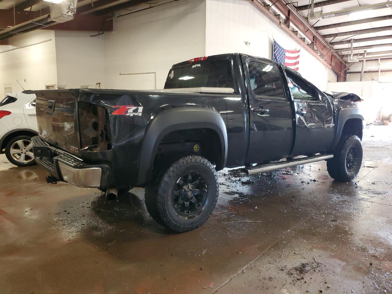 2010 GMC Sierra VIN 3GTRKVE32AG139433 Copart auction photo, rollover / top/roof damage thumbnail 3