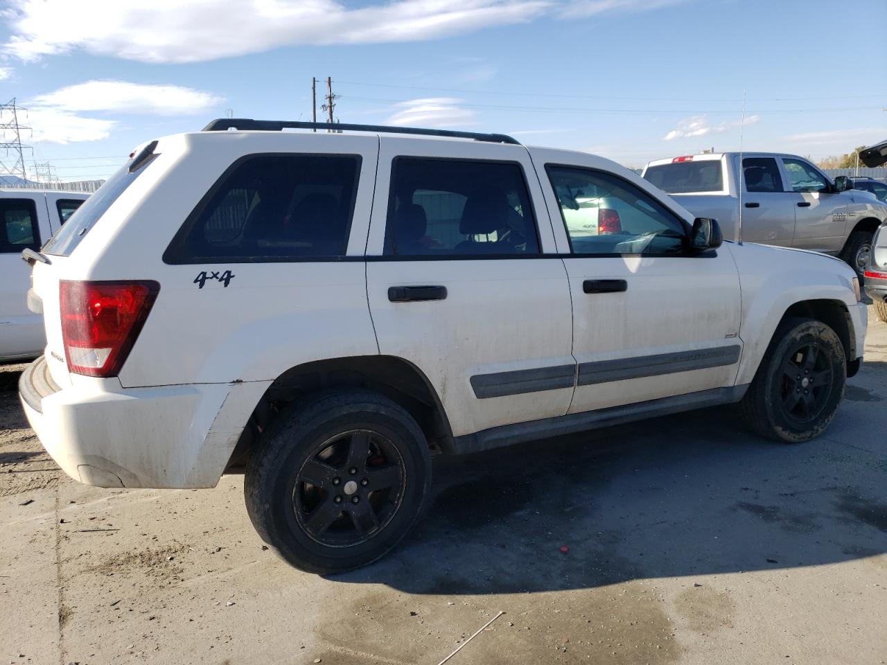2005 Jeep Grand Cherokee VIN 1J4GR48K45C670118 Copart auction photo, front end / hail damage thumbnail 3