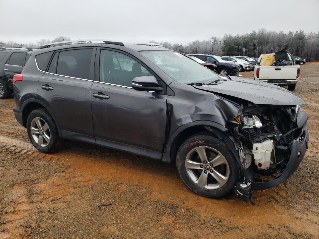 2015 Toyota RAV 4 VIN 2T3RFREV7FW353919 Copart auction photo, all over damage thumbnail 4