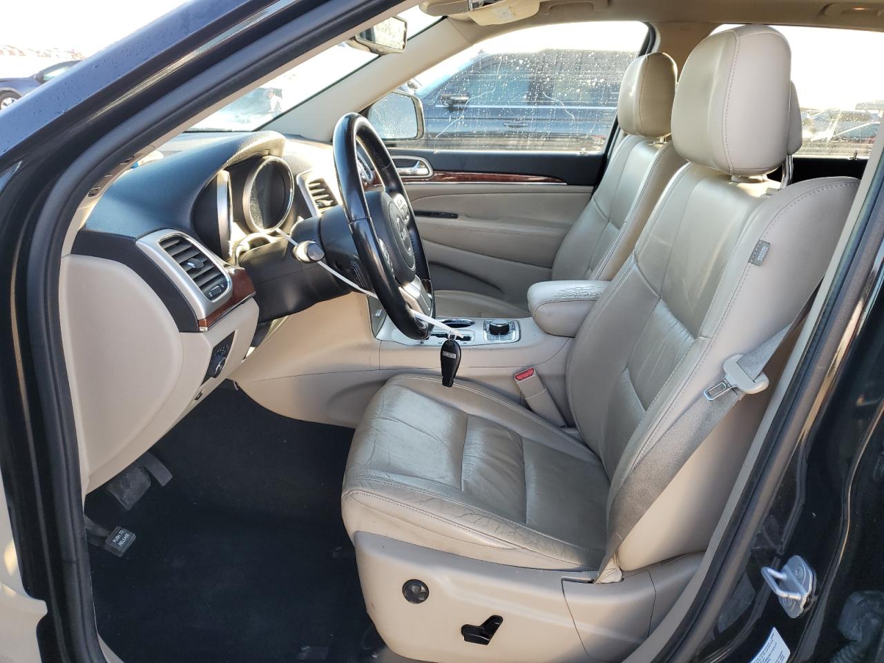 2012 Jeep Grand Cherokee VIN 1C4RJFBT9CC170987 Copart auction photo, side / front end damage thumbnail 7