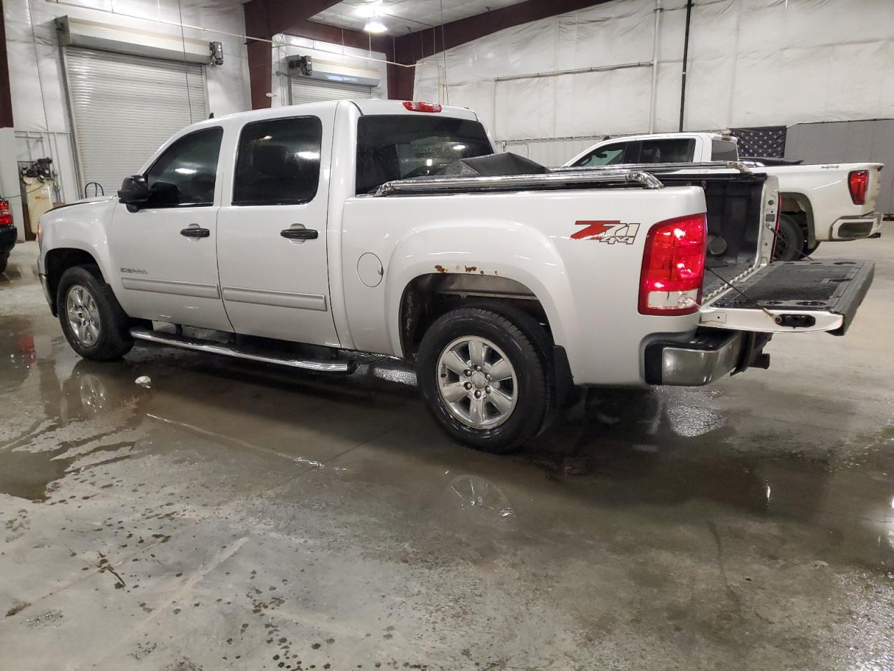 2013 GMC Envoy VIN 3GTP2VE74DG264898 Copart auction photo, all over damage thumbnail 2