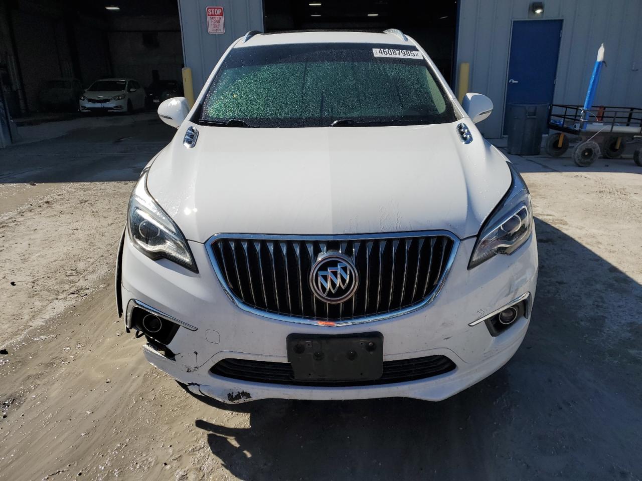 2017 Buick Envision VIN LRBFXBSA4HD089386 Copart auction photo, front end damage thumbnail 5