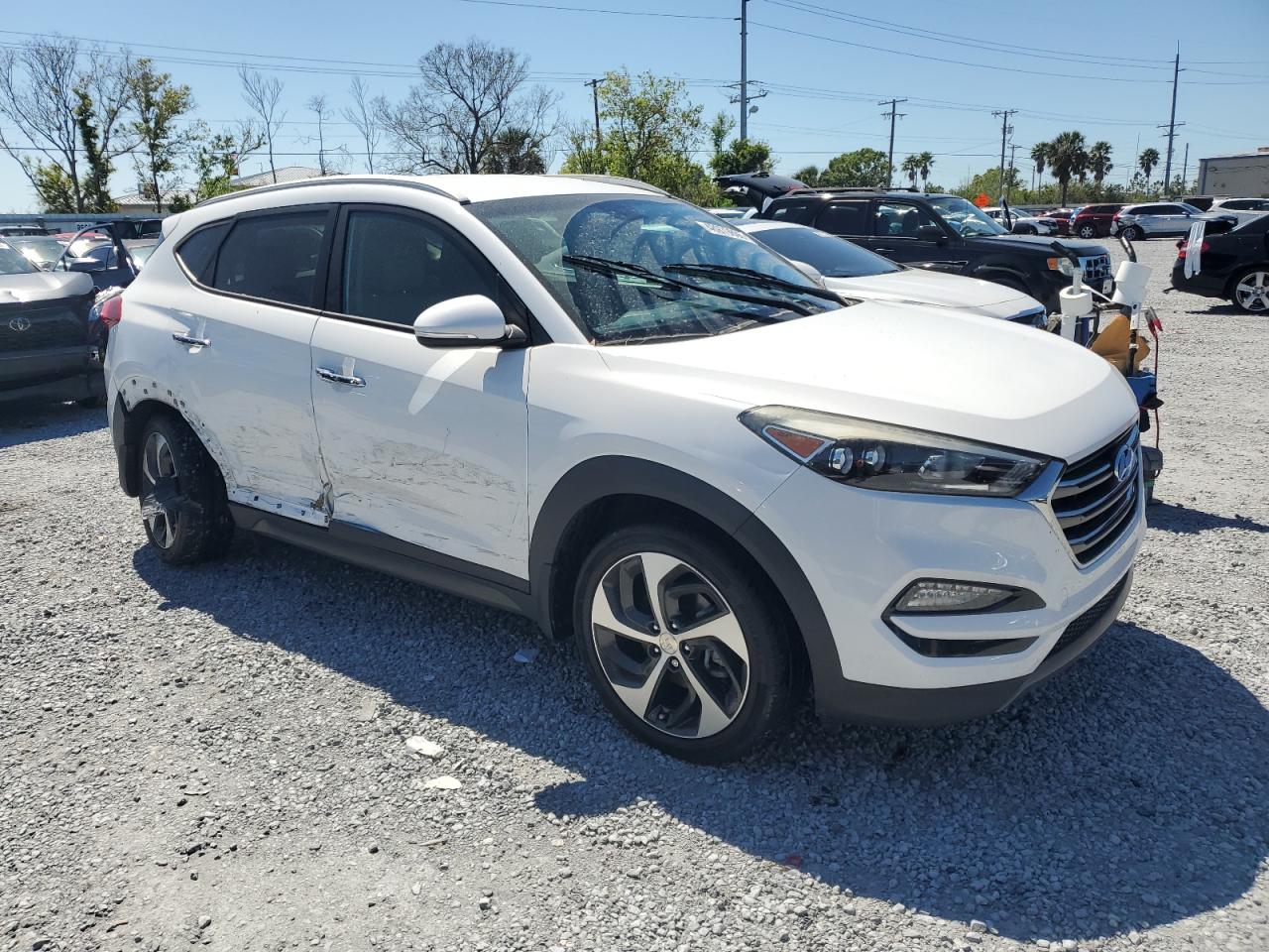 2016 Hyundai Tucson VIN KM8J33A20GU200260 Copart auction photo, side / front end damage thumbnail 4