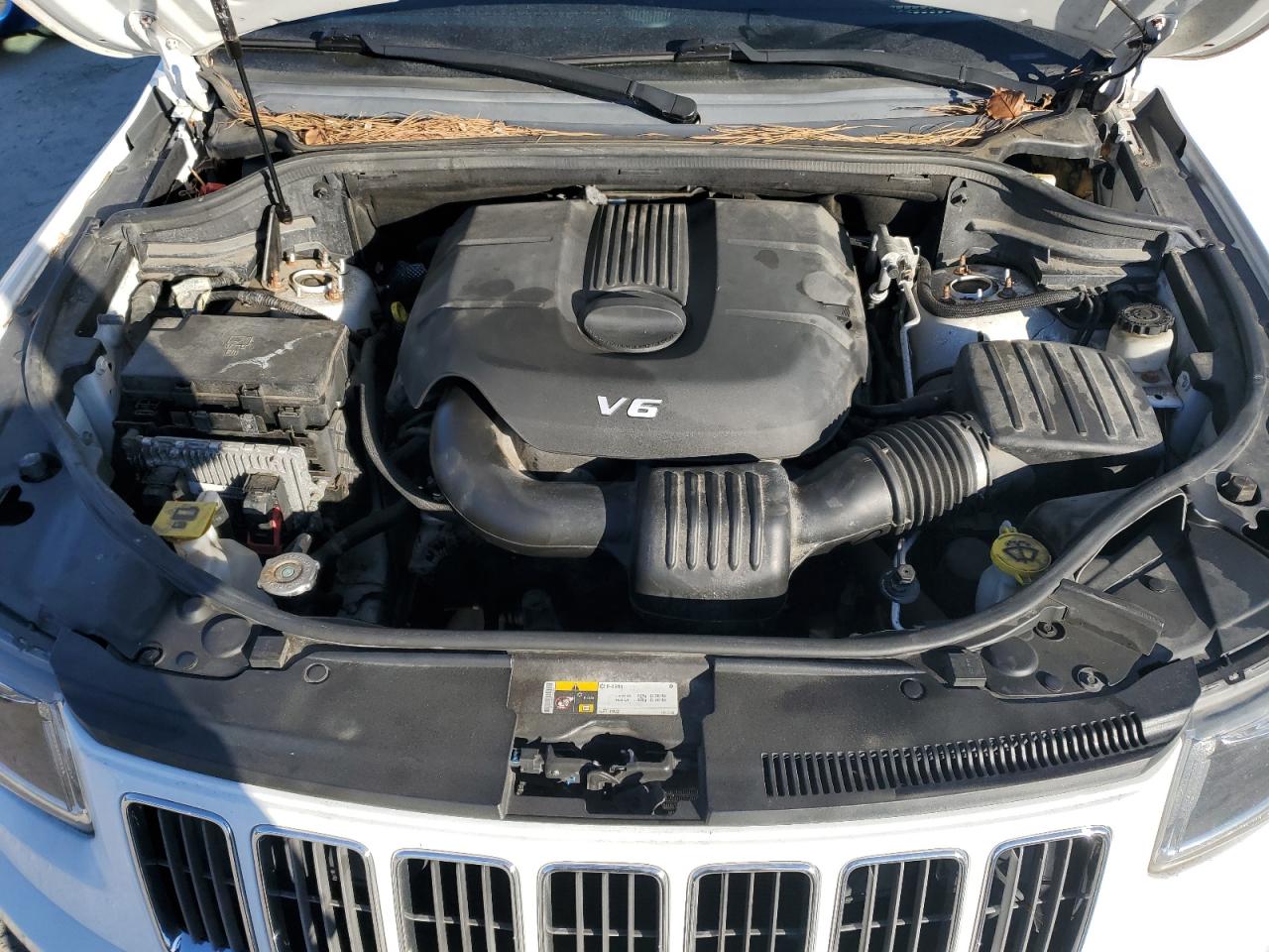 2014 Jeep Grand Cherokee VIN 1C4RJFBG8EC469943 Copart auction photo, rear end / minor dent/scratches damage thumbnail 11