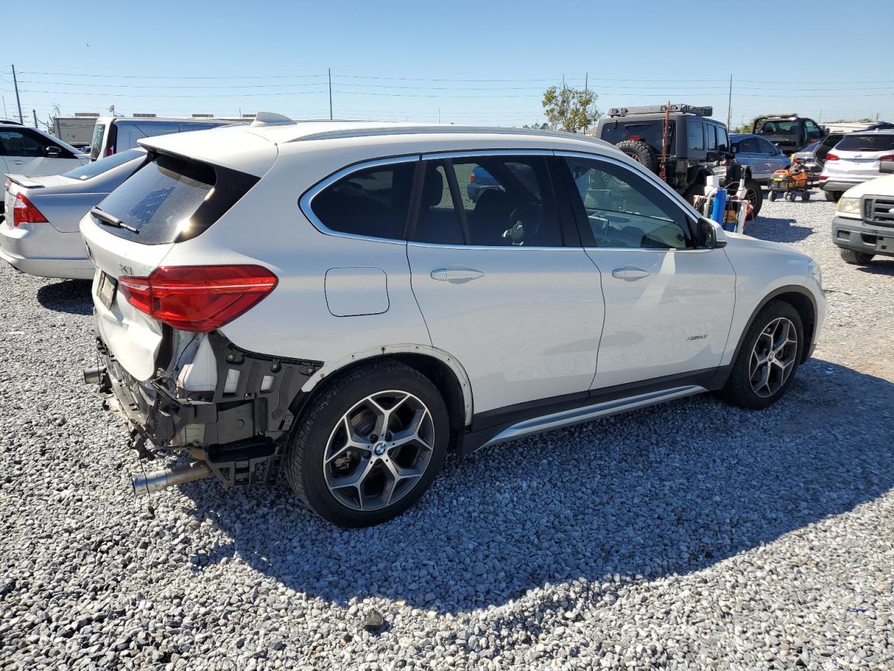 2017 BMW X1 VIN WBXHT3C30H5F84065 Copart auction photo, rear end damage thumbnail 3