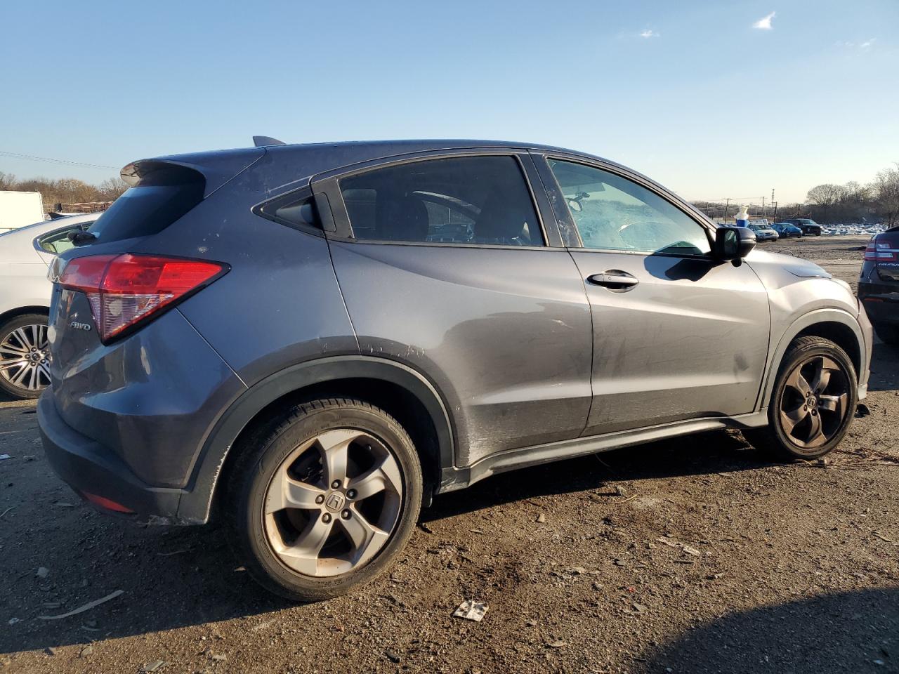 2017 Honda HR-V VIN 3CZRU6H54HM717566 Copart auction photo, side / rear end damage thumbnail 3