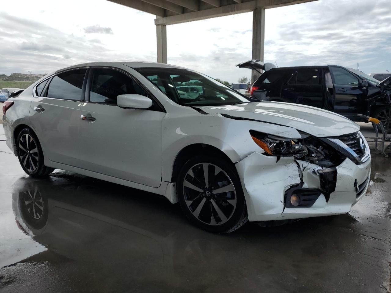2018 Nissan Altima VIN 1N4AL3AP4JC201642 Copart auction photo, rear end / front end damage thumbnail 4
