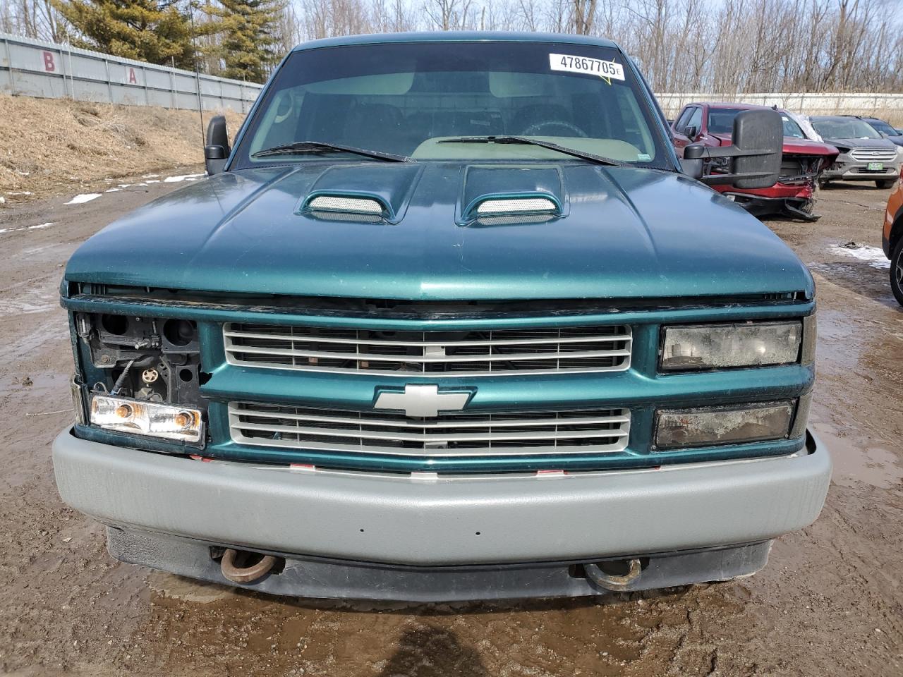 1995 Chevrolet GMT-400 VIN 2GCEK19K8S1232752 Copart auction photo, side / front end damage thumbnail 5