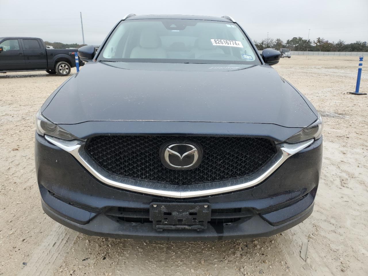 2021 Mazda CX-5 VIN JM3KFBAY4M0345083 Copart auction photo, water/flood / minor dent/scratches damage thumbnail 5