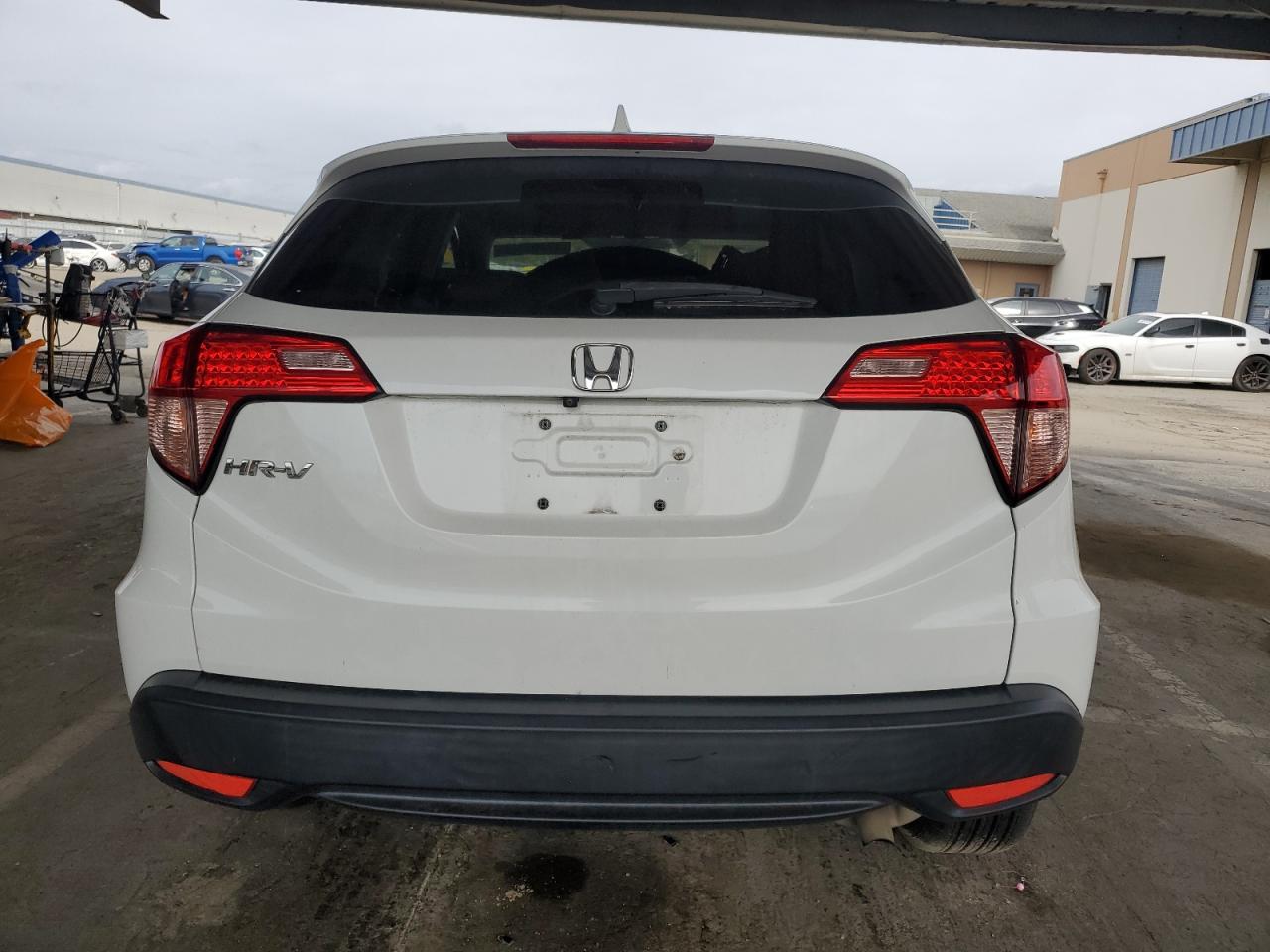 2018 Honda HR-V VIN 3CZRU5H53JM716344 Copart auction photo, side / front end damage thumbnail 6