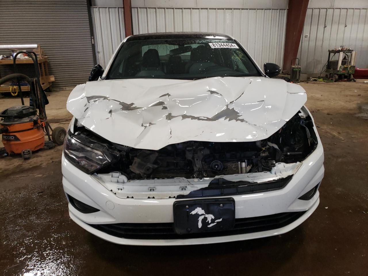 2019 Volkswagen Jetta VIN 3VWC57BU9KM085585 Copart auction photo, front end / side damage thumbnail 5