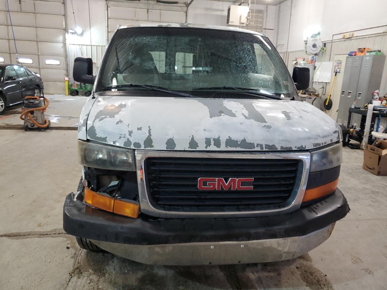 2003 GMC Savana VIN 1GTGG25U731154379 Copart auction photo, all over damage thumbnail 5