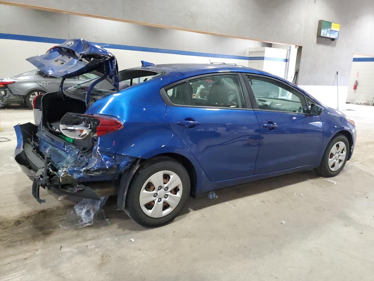 2018 KIA Forte VIN 3KPFL4A77JE284756 Copart auction photo, rear end damage thumbnail 3
