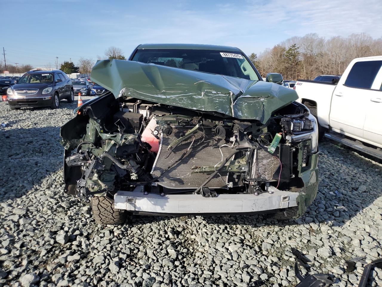 2023 Toyota Tundra VIN 5TFJA5DB5PX085784 Copart auction photo, front end damage thumbnail 5
