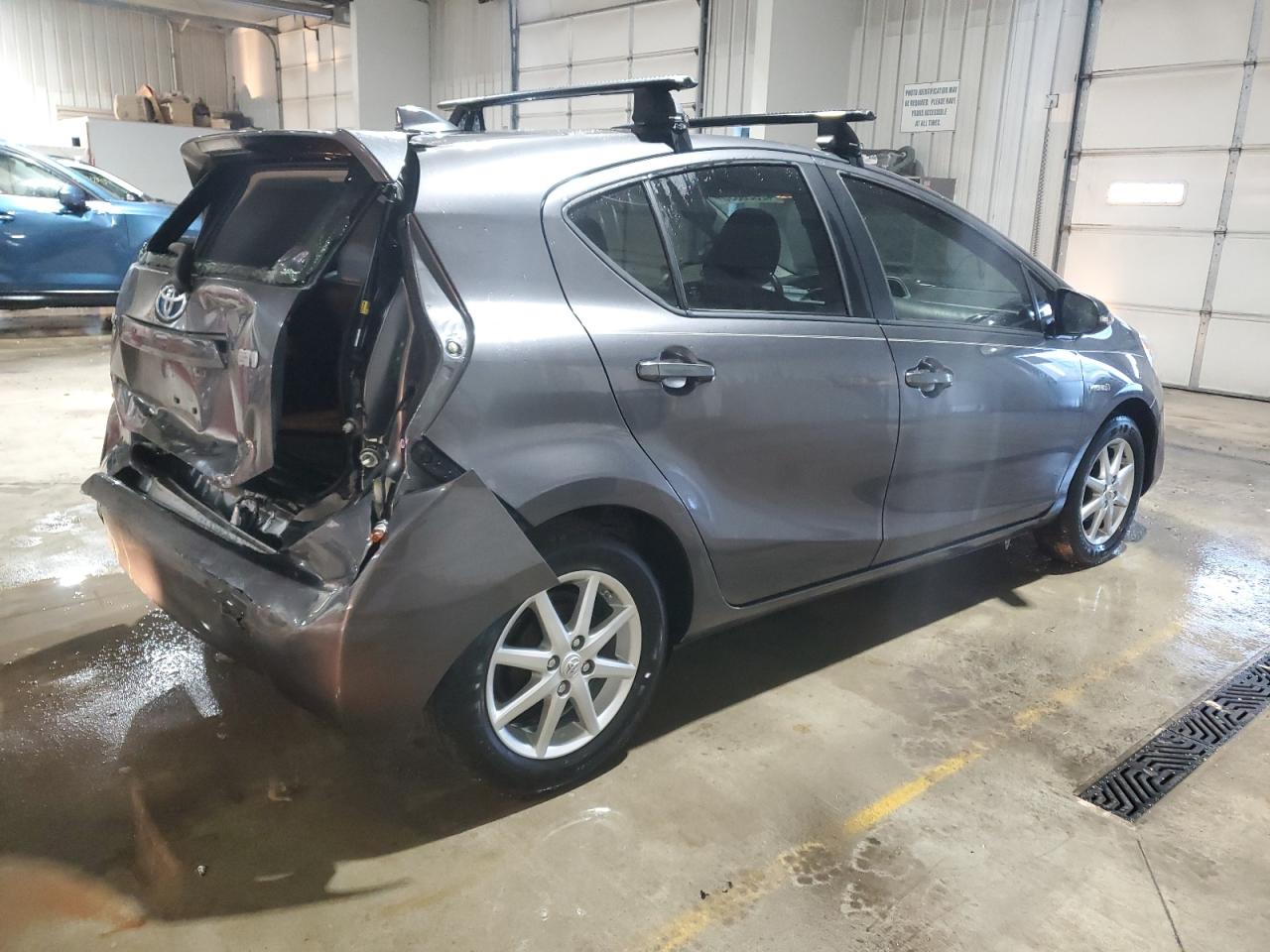 2015 Toyota Prius VIN JTDKDTB37F1106499 Copart auction photo, rear end damage thumbnail 3