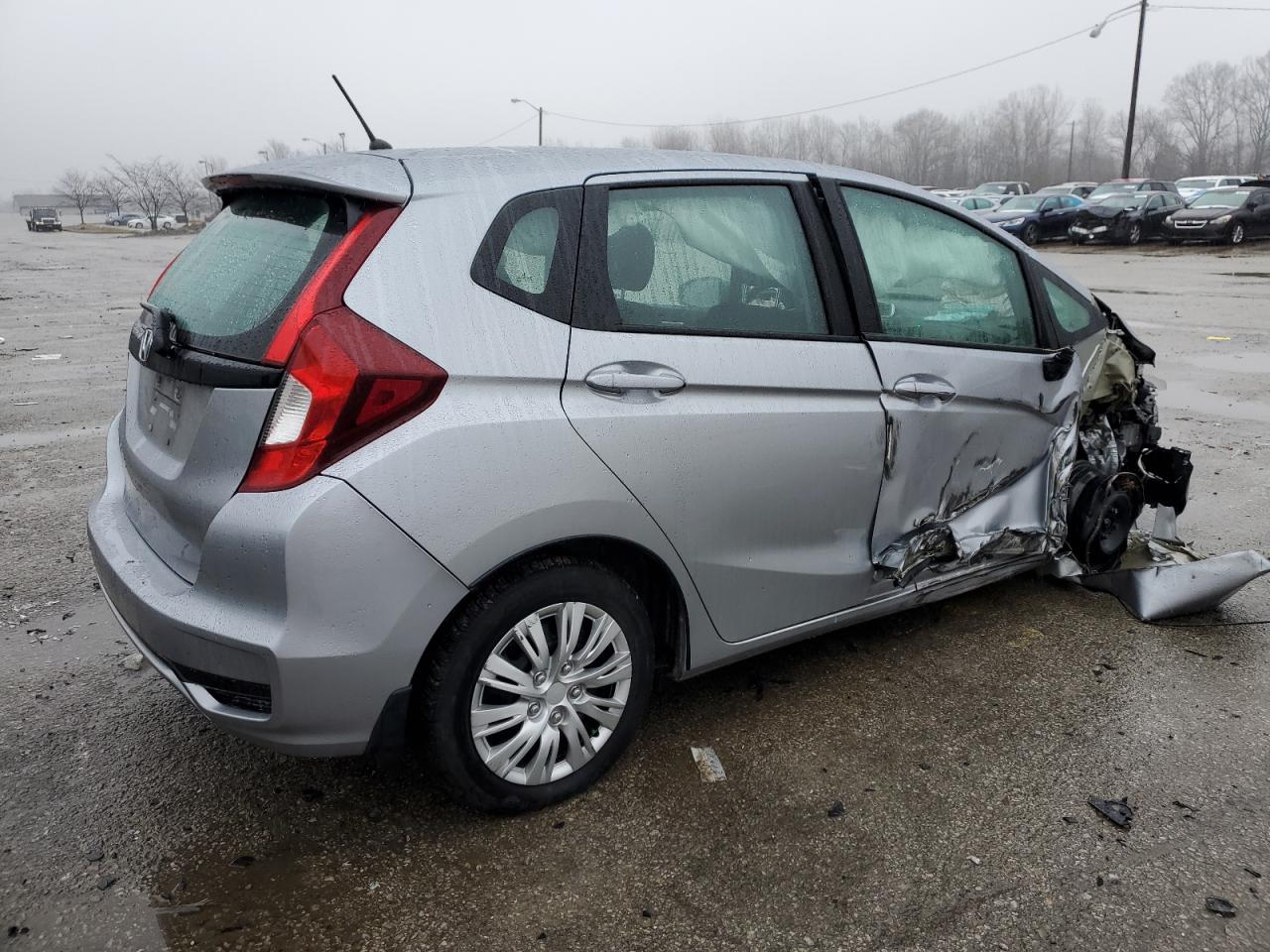 2019 Honda Fit VIN 3HGGK5H43KM750801 Copart auction photo, side / front end damage thumbnail 3