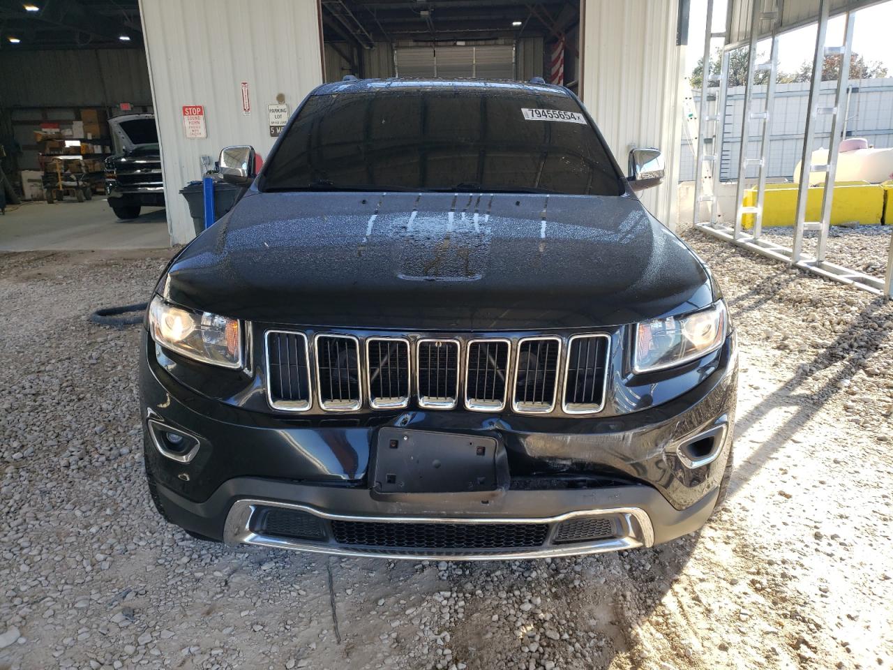 2015 Jeep Grand Cherokee VIN 1C4RJFBGXFC713433 Copart auction photo, front end / minor dent/scratches damage thumbnail 5