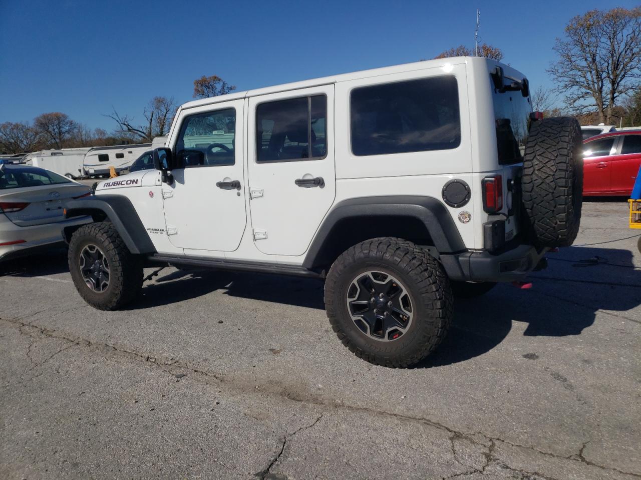 2015 Jeep Wrangler VIN 1C4HJWFG0FL615405 Copart auction photo, side / minor dent/scratches damage thumbnail 2