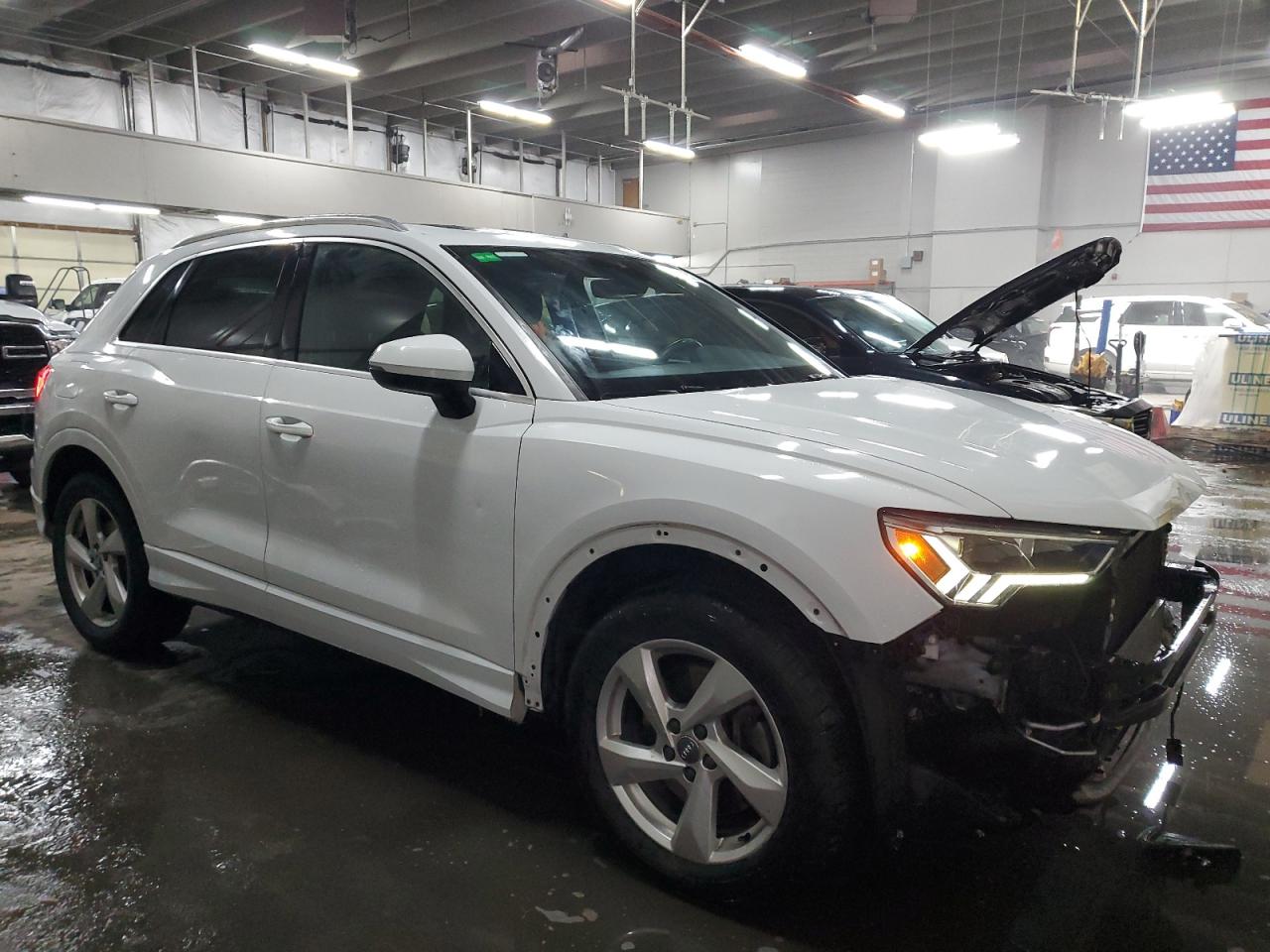 2020 Audi Q3 VIN WA1BECF34L1018846 Copart auction photo, front end / side damage thumbnail 4
