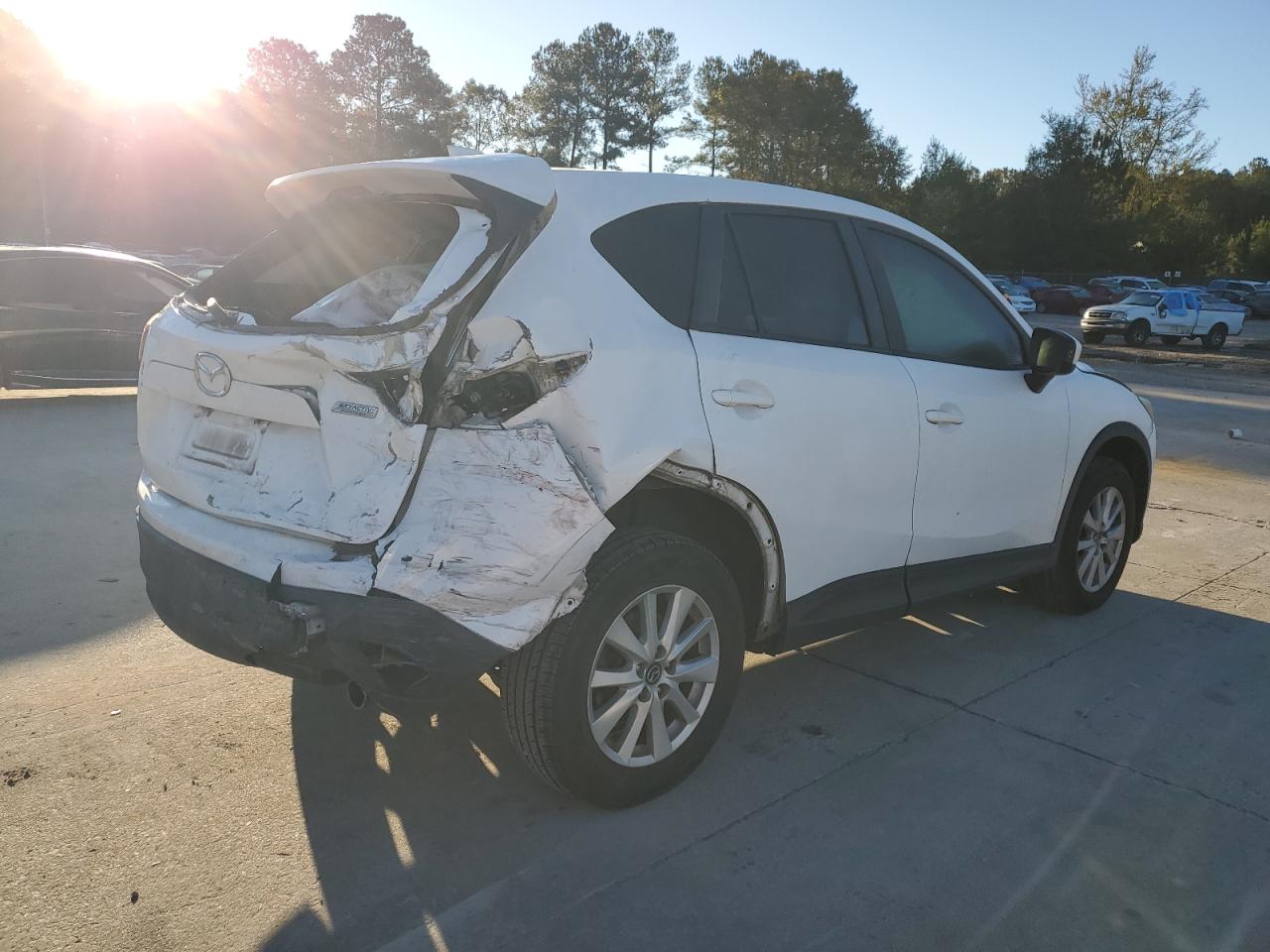 2014 Mazda CX-5 VIN JM3KE2CY6E0310529 Copart auction photo, all over / rear end damage thumbnail 3