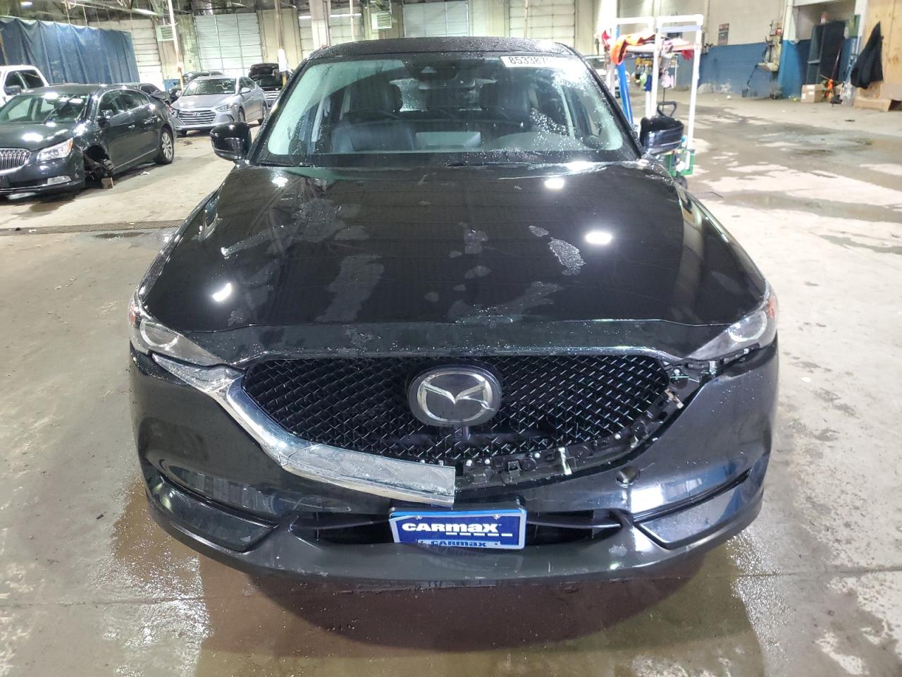 2021 Mazda CX-5 VIN JM3KFBCM6M1463656 Copart auction photo, all over / undercarriage damage thumbnail 5