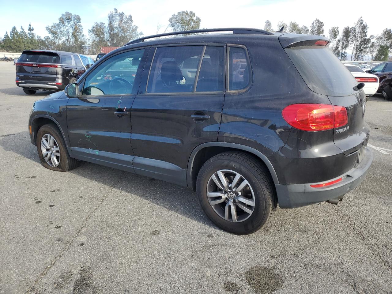 2016 Volkswagen Tiguan VIN WVGAV7AXXGW602062 Copart auction photo, undercarriage / minor dent/scratches damage thumbnail 2