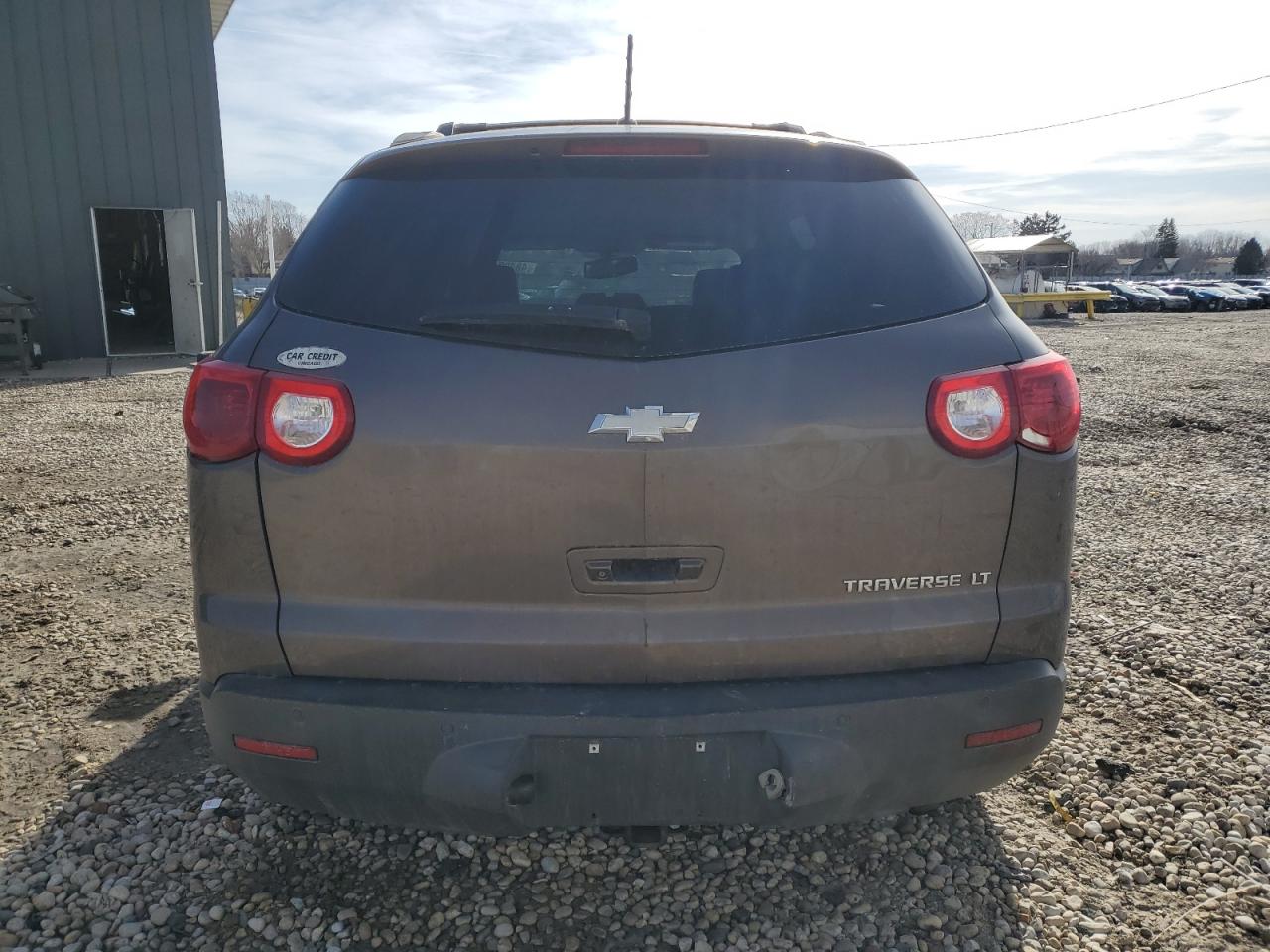 2009 Chevrolet Traverse VIN 1GNER23D99S174079 Copart auction photo, front end / side damage thumbnail 6