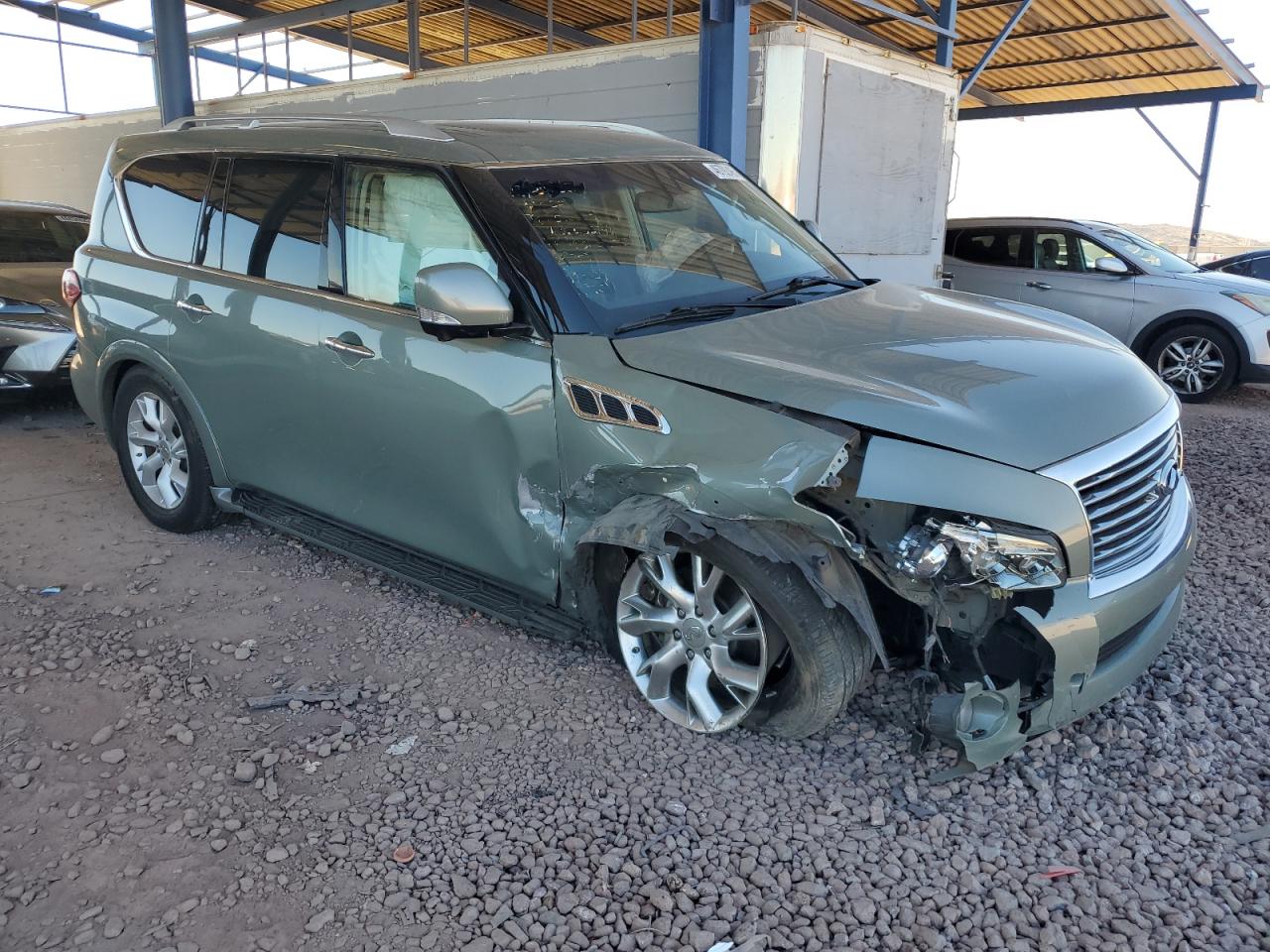 2012 Infiniti QX56 VIN JN8AZ2NC8C9316307 Copart auction photo, front end / side damage thumbnail 4