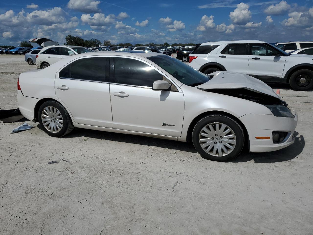 2010 Ford Fusion VIN 3FADP0L31AR310183 Copart auction photo, frame damage / front end damage thumbnail 4