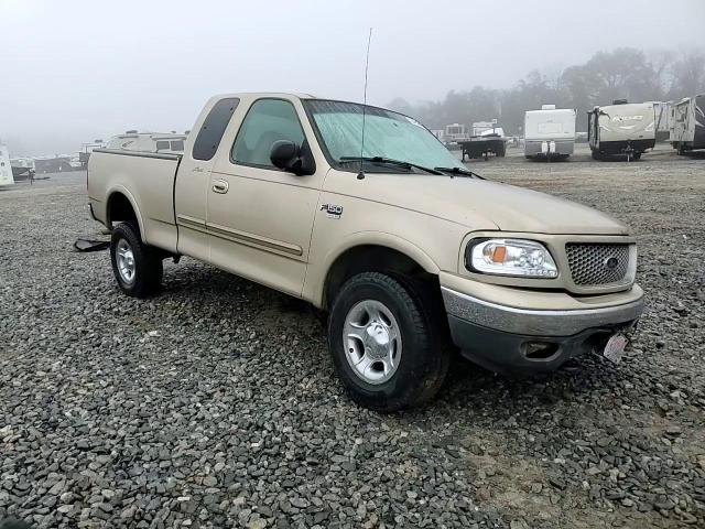 1999 Ford F-150 VIN 1FTRX18L7XNB64656 Copart auction photo, all over damage thumbnail 10