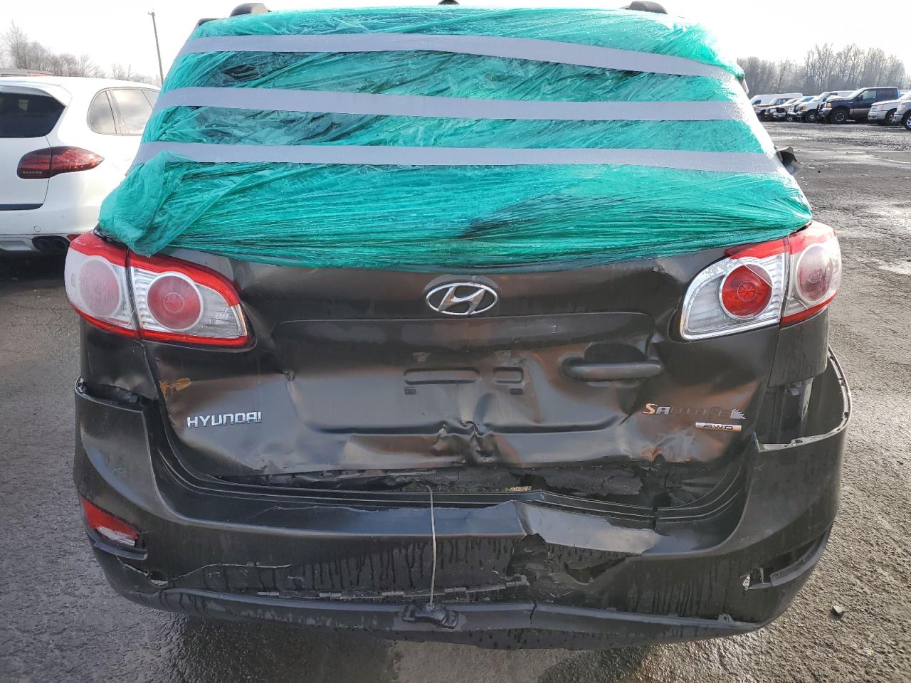 2011 Hyundai Santa Fe VIN 5XYZGDAG0BG078636 Copart auction photo, rear end / front end damage thumbnail 6