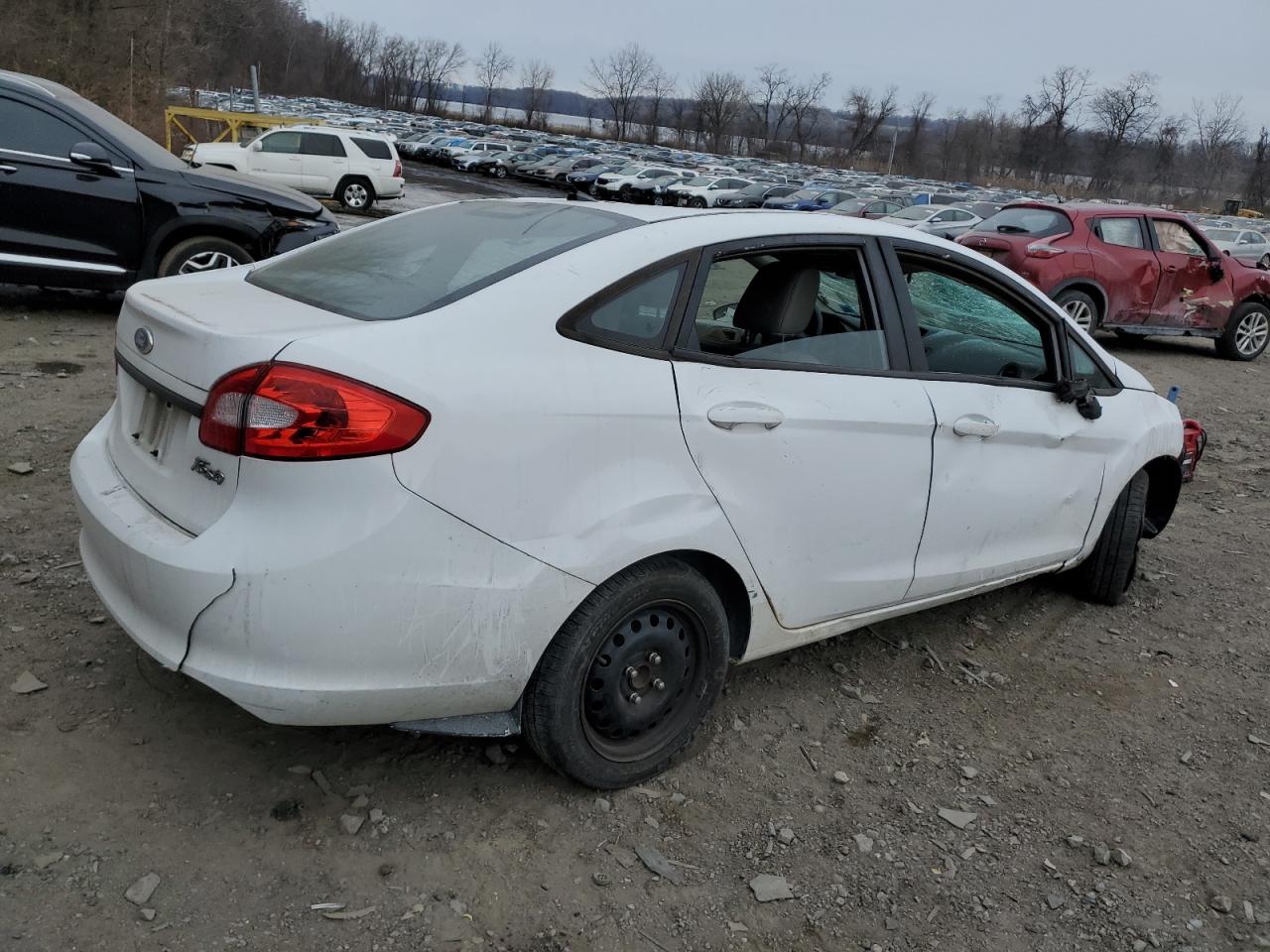 2011 Ford Fiesta VIN 3FADP4AJ3BM238202 Copart auction photo, all over / missing/altered vin damage thumbnail 3